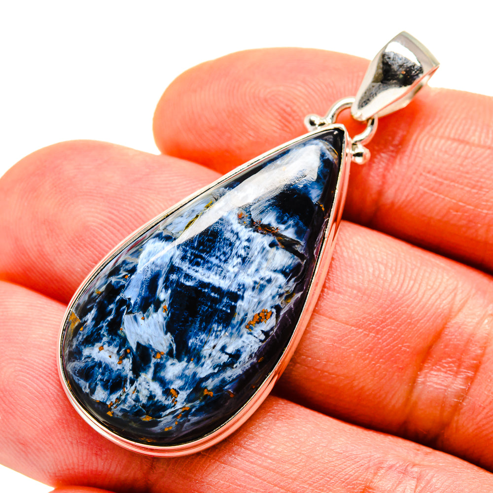 Sterling silver pietersite teardrop pendant close-up, blue and white stone with flecks