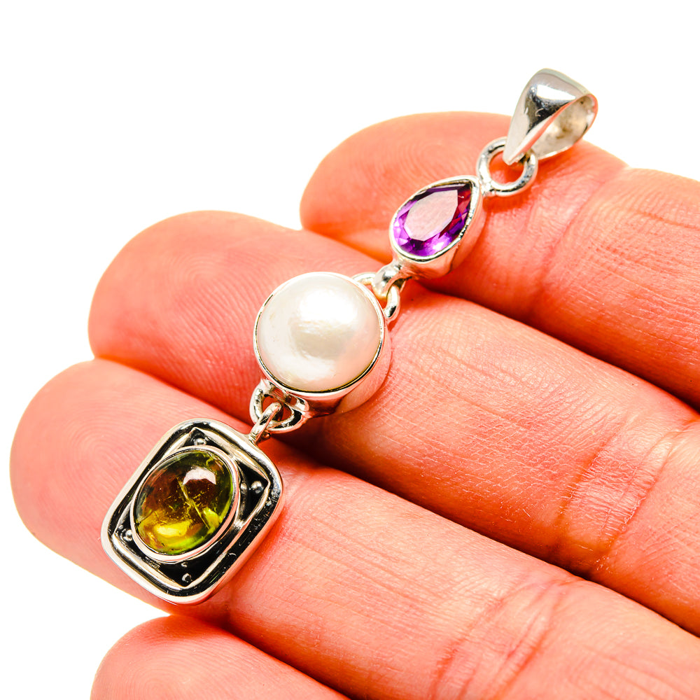 Sterling silver pendant with cultured pearl and faceted amethyst and peridot stones