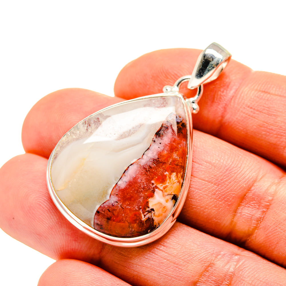 Sterling silver teardrop pendant with red, orange and cream ocean jasper cabochon