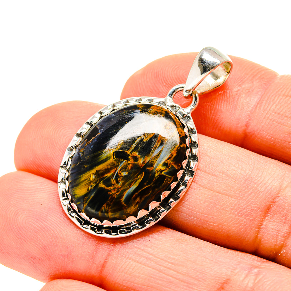 Oval sterling silver pendant with pietersite stone, black with gold and yellow streaks