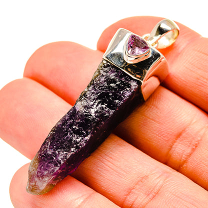 Rough amethyst pendant with purple crystal in silver bezel and loop bail