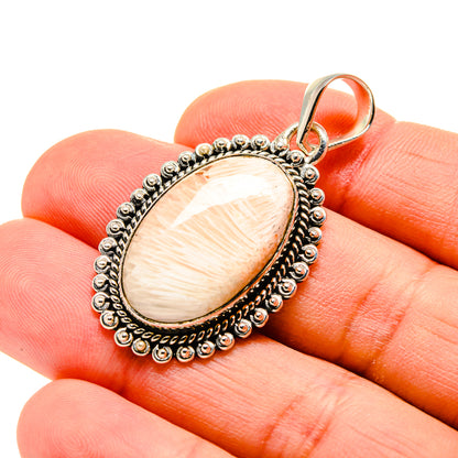 Oval scolecite pendant with pale cream cabochon, beaded sterling silver frame, bail