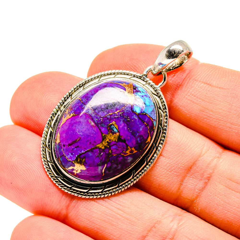 Oval purple turquoise pendant with silver bezel and loop bail, purple and blue stone.