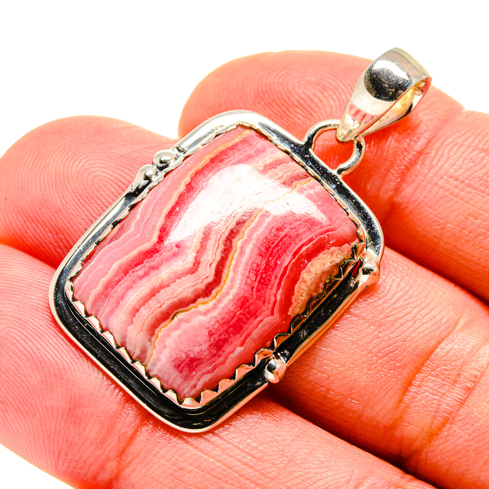 Sterling silver rhodochrosite pendant, rectangular frame with red/pink banded stone, bail