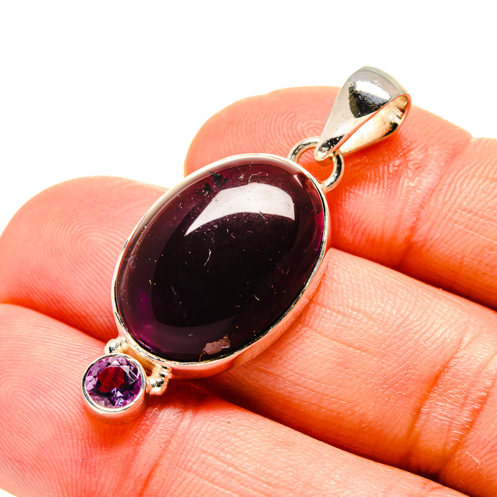 Amethyst pendant in 925 sterling silver with dark oval and small round stones