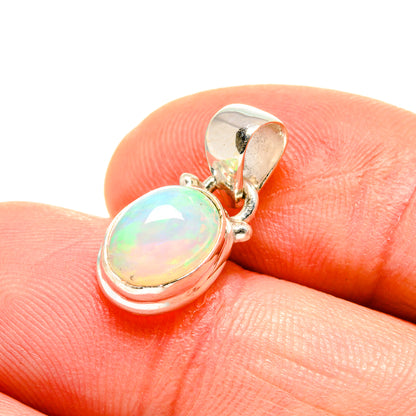 Oval opal cabochon pendant in sterling silver, close-up on bail and setting