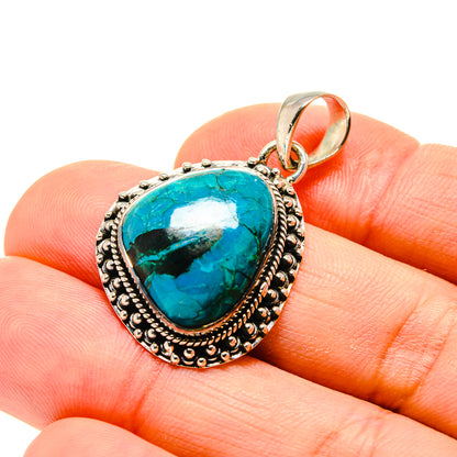 Turquoise teardrop pendant with loop bail and ornate silver-tone frame