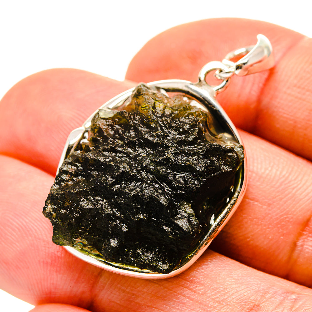 Sterling silver Czech Moldavite pendant with dark natural stone slice and loop bail