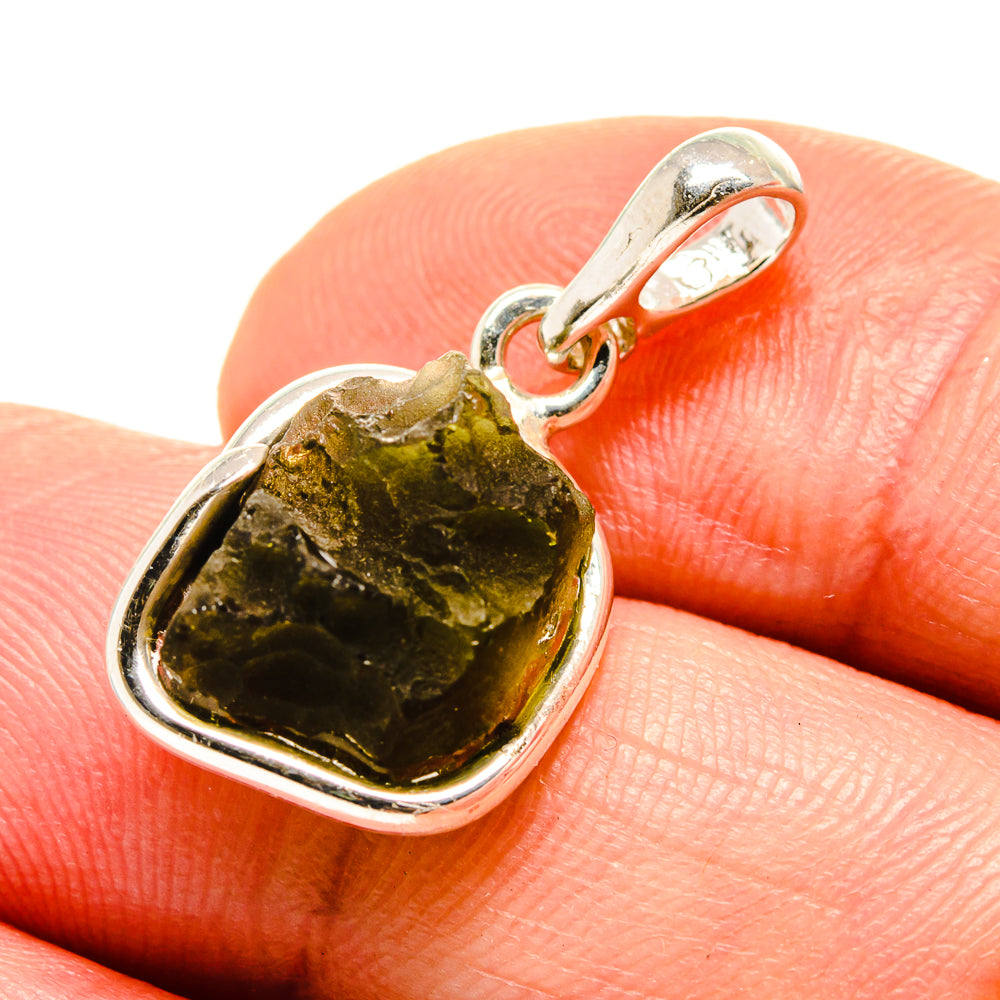 Green moldavite pendant in 925 sterling silver, close-up on gemstone