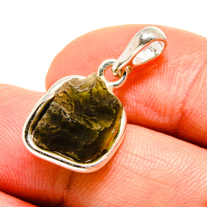 Green moldavite pendant in 925 sterling silver, close-up on gemstone