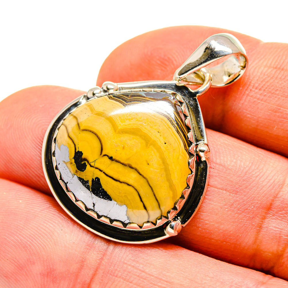 925 sterling silver pendant with oval yellow stone cabochon, black-and-white veining