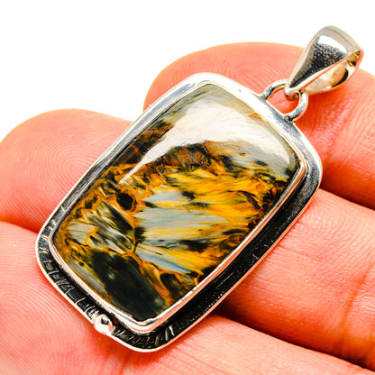 Sterling silver pendant with rectangular pietersite stone, metal frame and loop bail