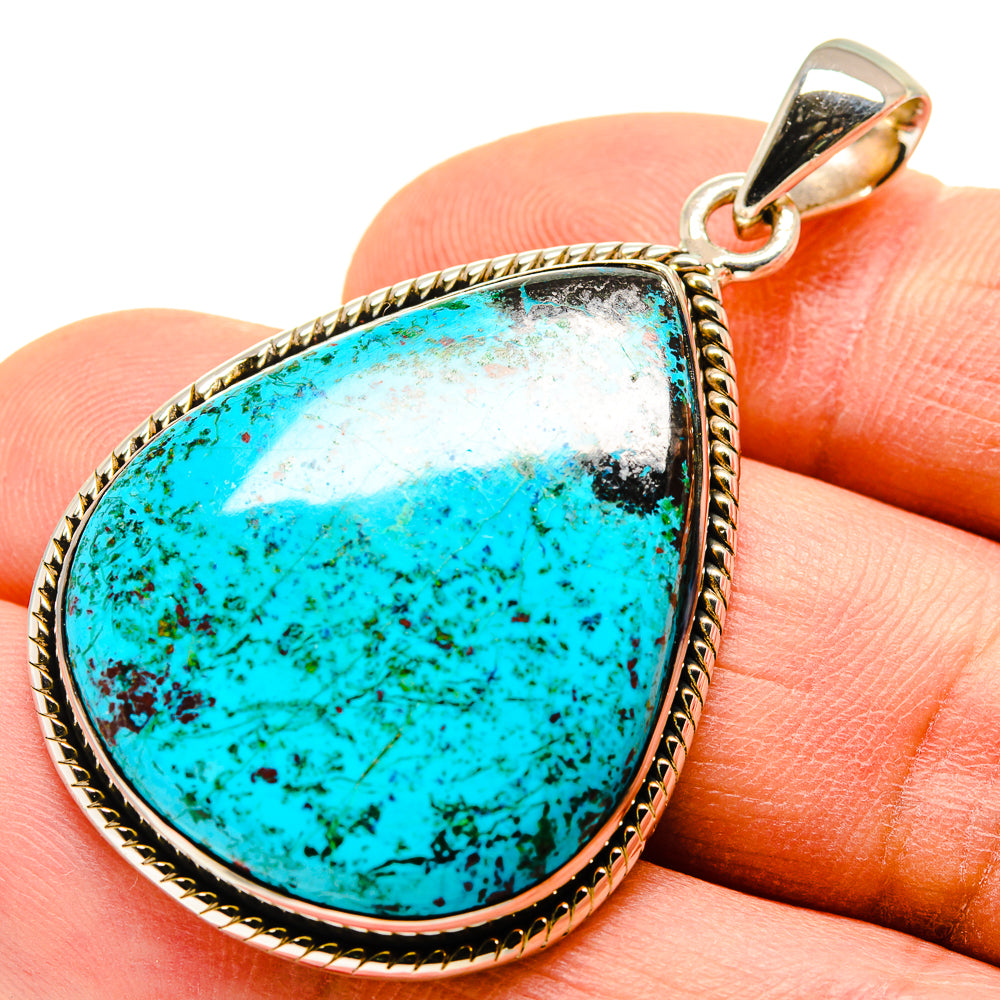 Turquoise teardrop pendant in 925 sterling silver with rope border and bail