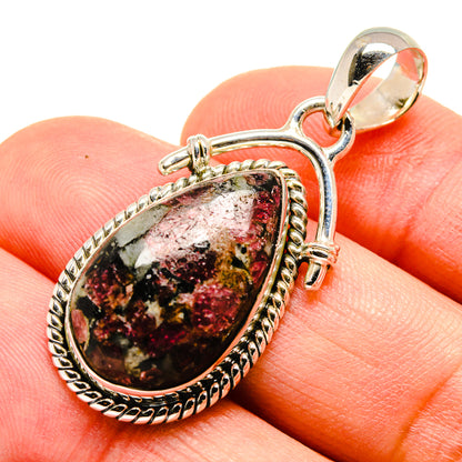Sterling silver Russian eudialyte teardrop pendant with ornate bezel and round bail
