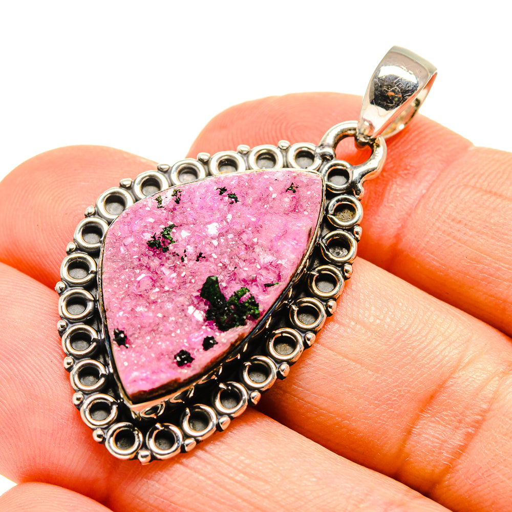 Pink druzy calcite teardrop pendant with silver beaded halo and bail on top