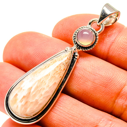 Sterling silver pendant with round pink cabochon and teardrop peach stone
