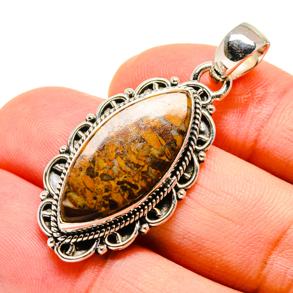 Sterling silver pendant with oval chert breccia stone, ornate halo and bail