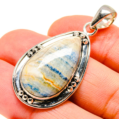 Blue scheelite teardrop pendant, 925 sterling silver with loop bail and polished border