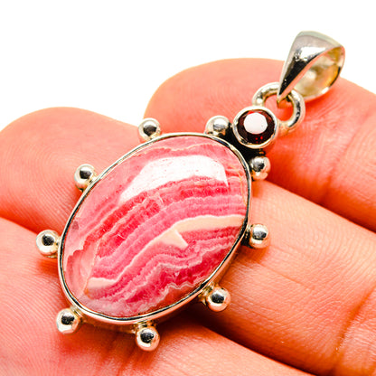Oval pink rhodochrosite pendant, 925 sterling silver with bead prong setting and bail