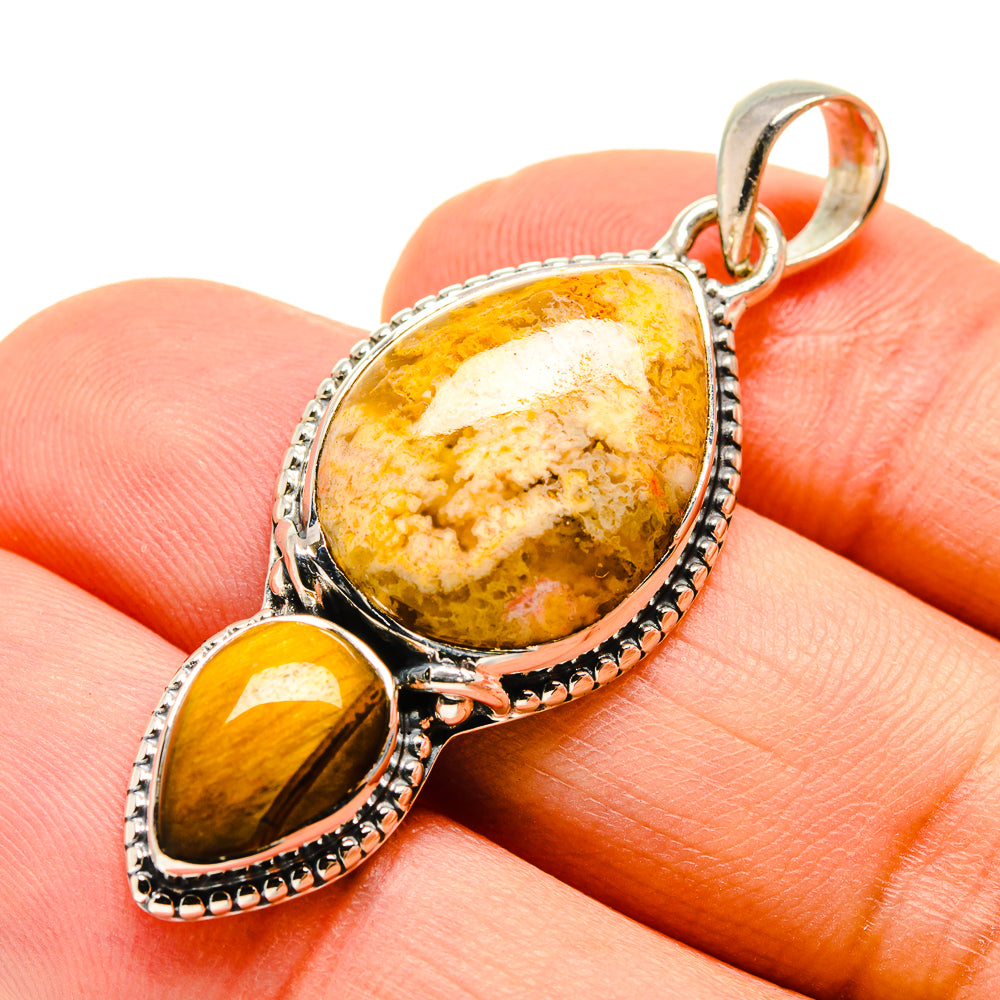 Tiger eye pendant with two oval stones in polished 925 sterling silver setting