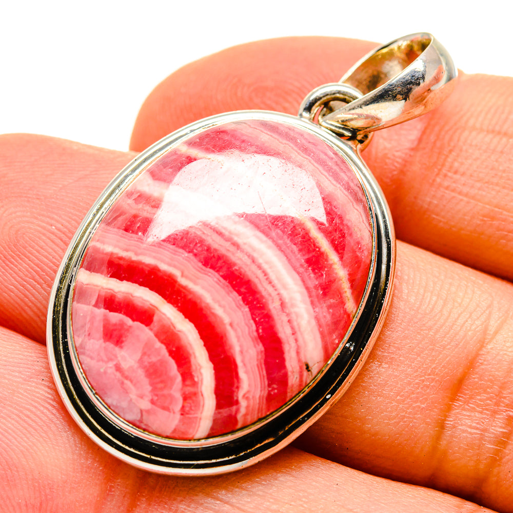 Rhodochrosite teardrop pendant with 925 sterling silver frame, pink-red stone with banded pattern