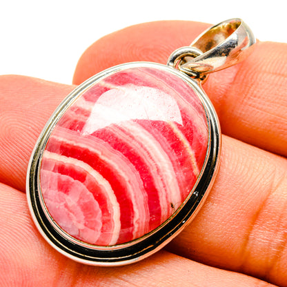 Rhodochrosite teardrop pendant with 925 sterling silver frame, pink-red stone with banded pattern