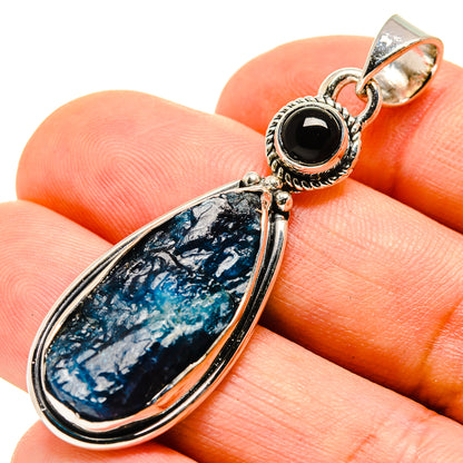 Sterling silver pendant with teardrop blue fluorite and round black onyx accent