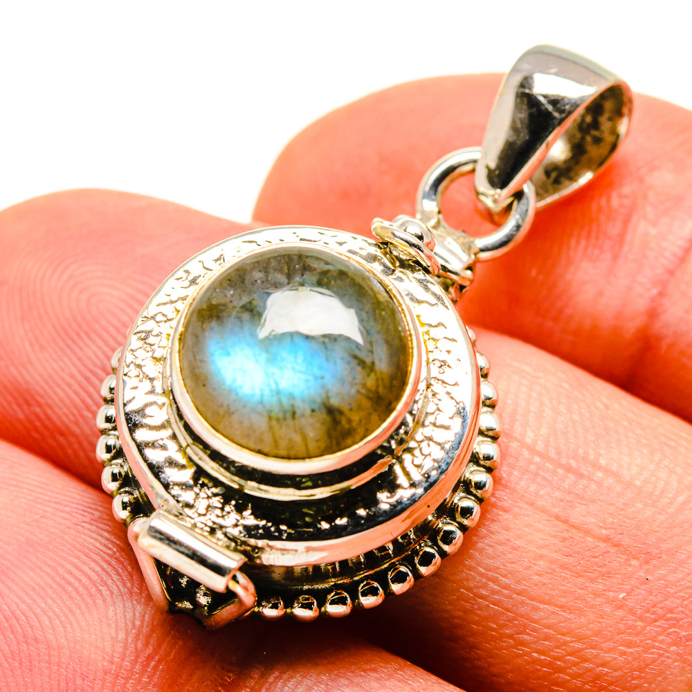 Labradorite cabochon poison-style pendant in sterling silver, round bezel and bail