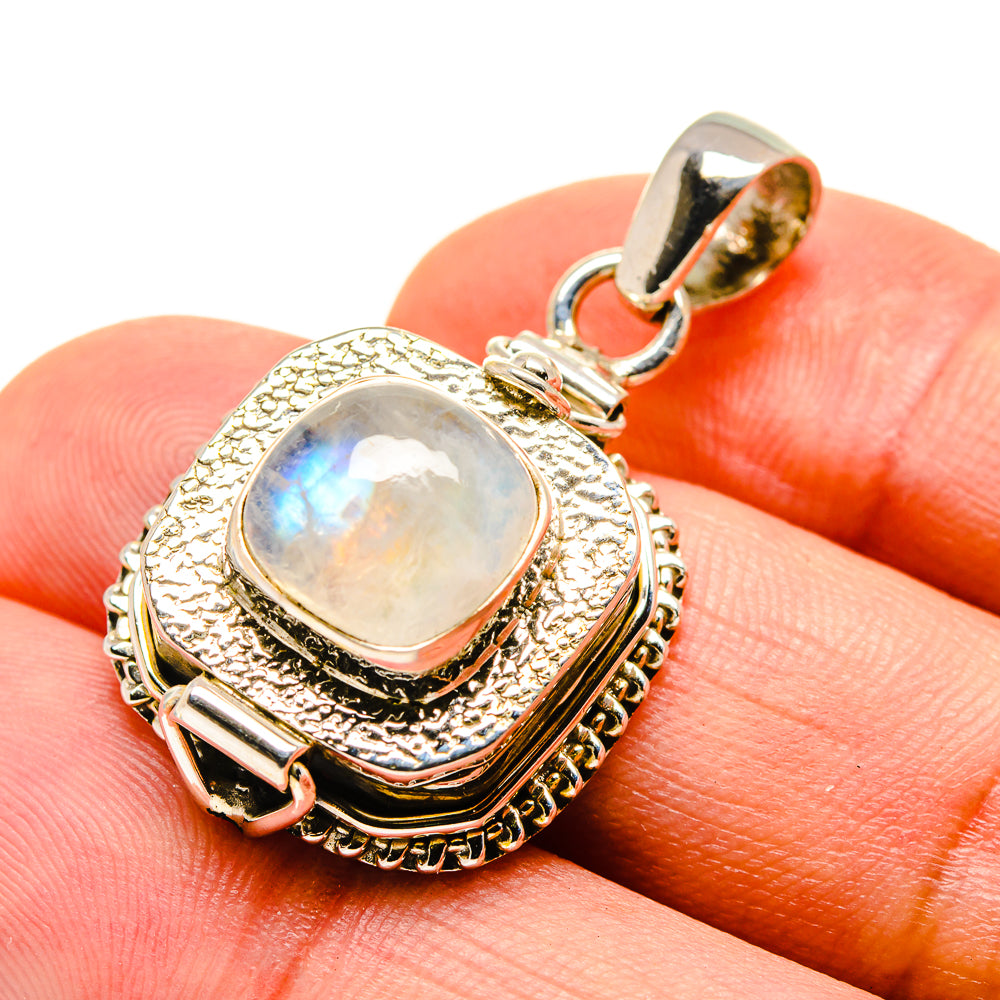 925 sterling silver moonstone pendant with round frame and rainbow opal-like center