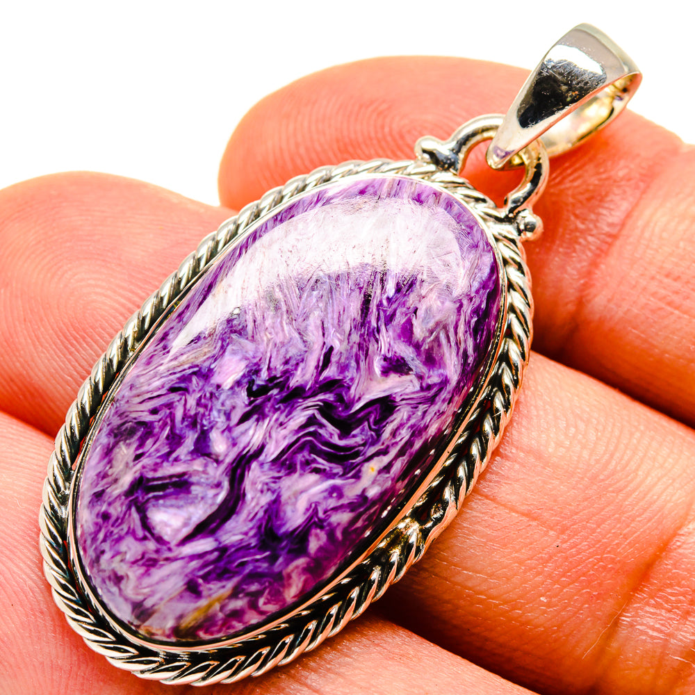 Charoite oval pendant in sterling silver bezel with textured rope frame
