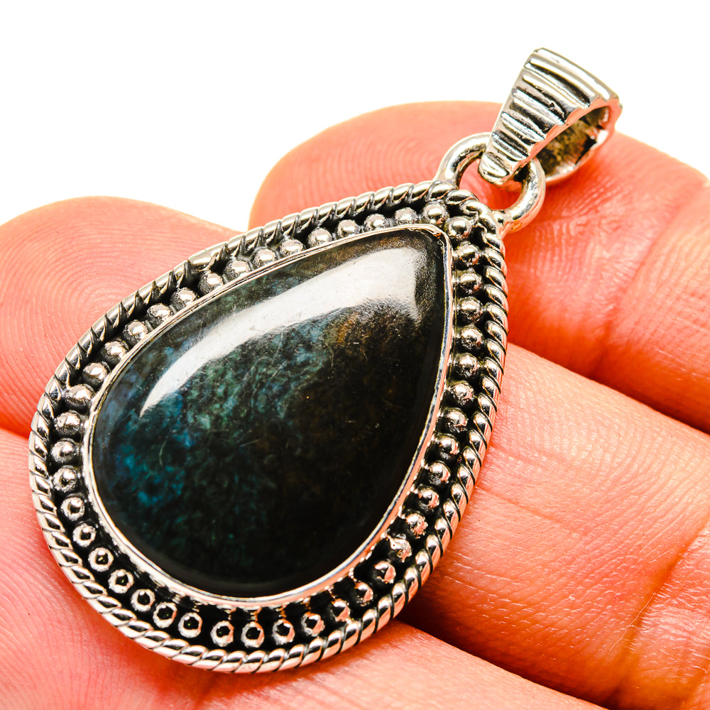 Sterling silver teardrop pendant with green chrysocolla cabochon and ridged bail