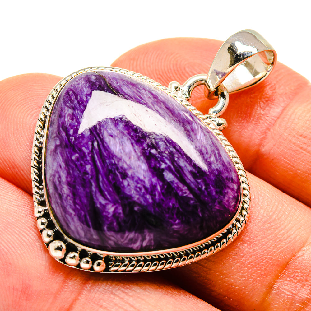 Heart-shaped charoite pendant with purple cabochon and 925 silver bezel, bail detail