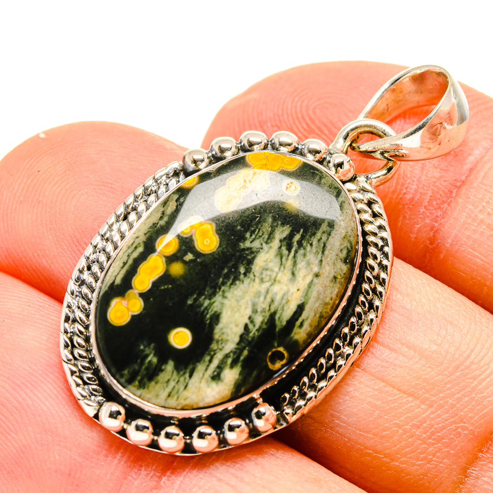 Ocean jasper pendant, oval dark green stone with yellow spots, sterling silver bezel