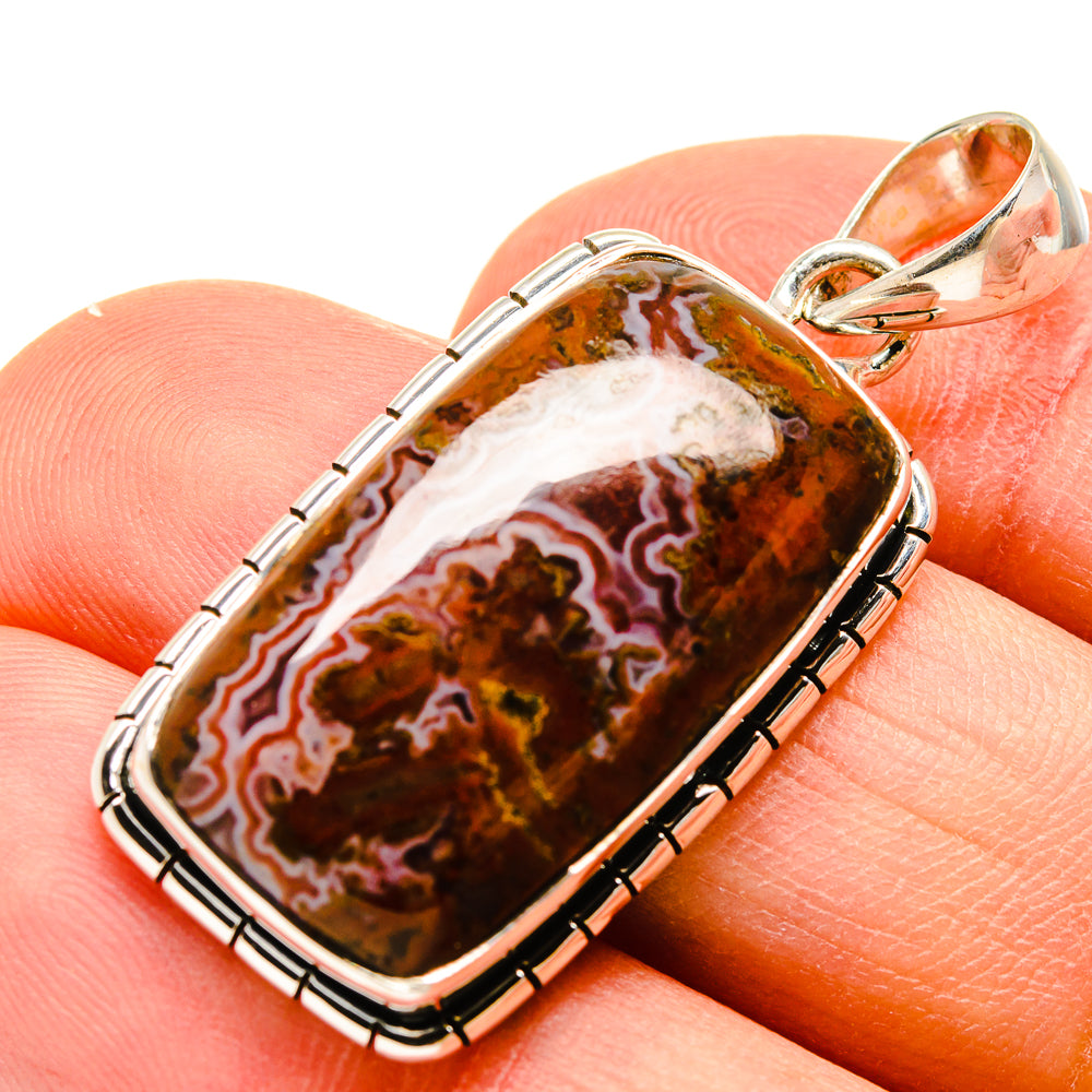 Rectangular sterling silver pendant with orange-brown Moroccan agate cabochon and bail