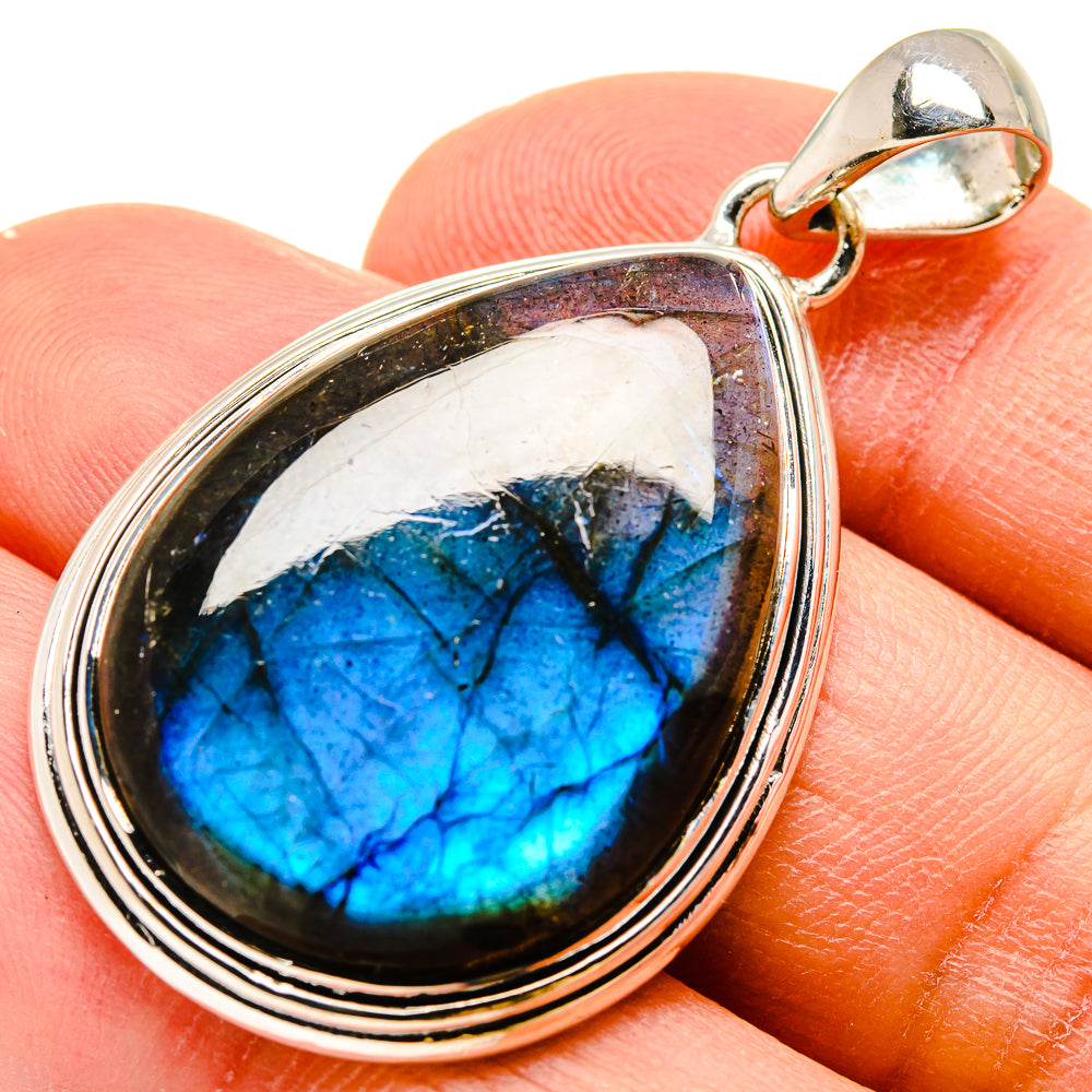 Sterling silver labradorite teardrop pendant with vivid blue iridescent stone in bezel setting