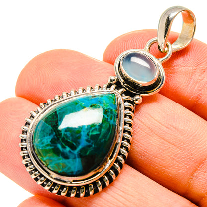 Teardrop aqua stone pendant with ornate silver frame and small round bail