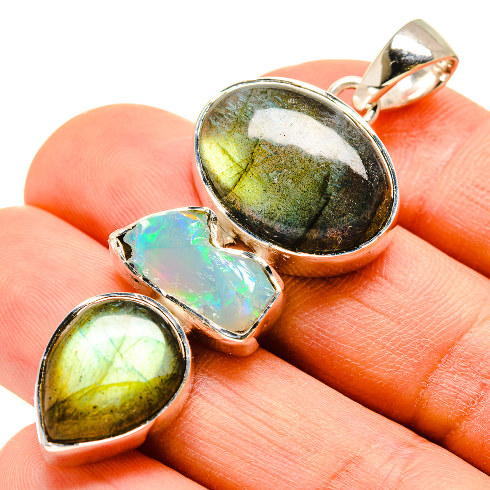 Rough gemstone pendant in 925 sterling silver, labradorite and opal with bezel settings