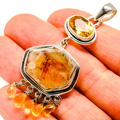 Sterling silver citrine pendant with oval bezel and dangling citrine charms
