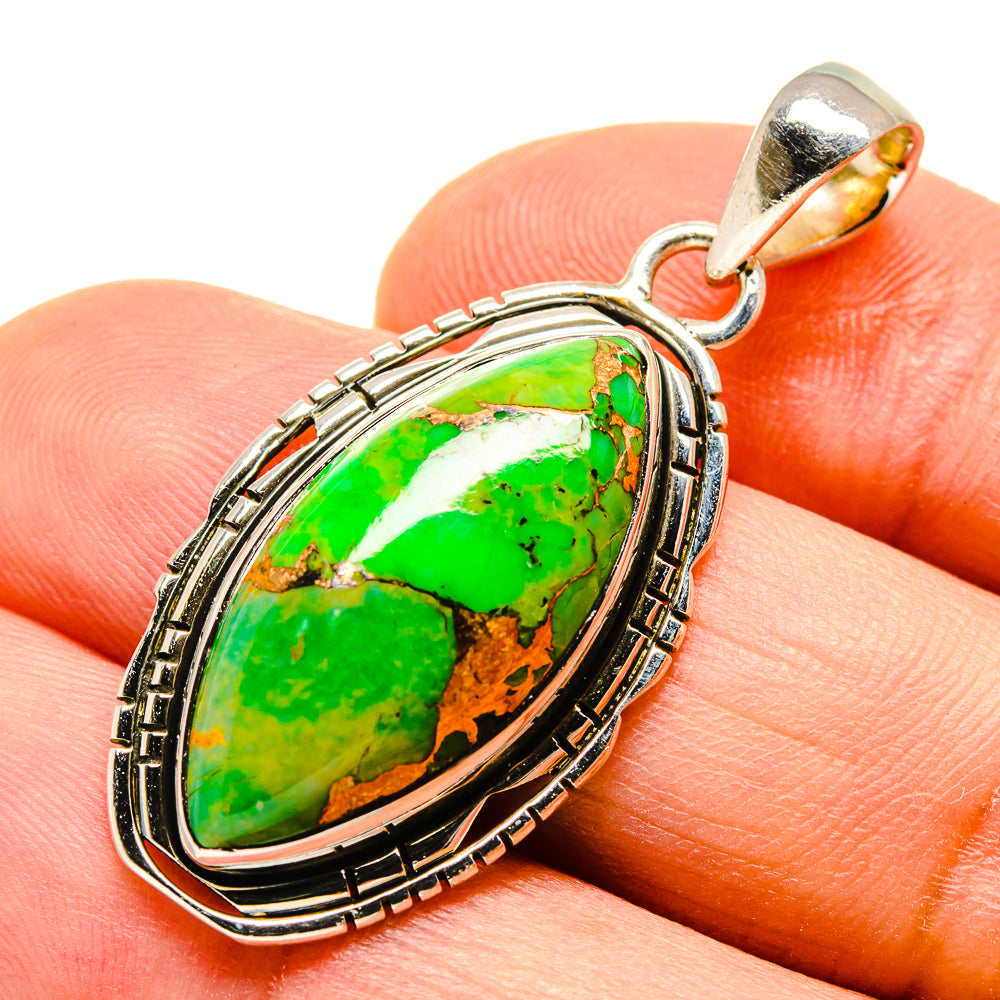 Green turquoise composite pendant in oval sterling silver bezel with bail, close-up