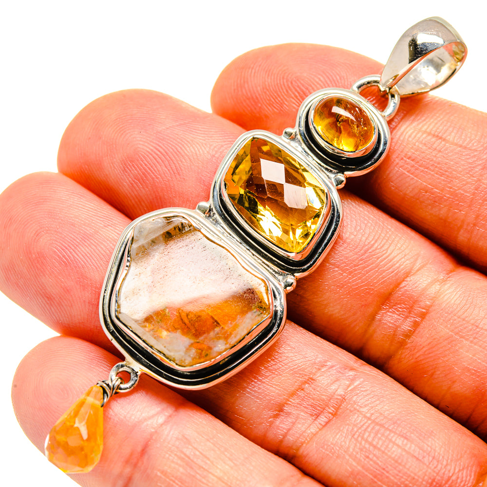 Rough citrine pendant in 925 sterling silver, three yellow stone settings with top bail