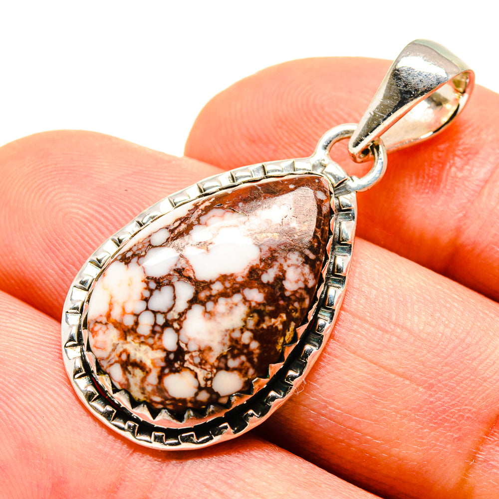 Red jasper teardrop pendant with textured 925 silver frame and loop