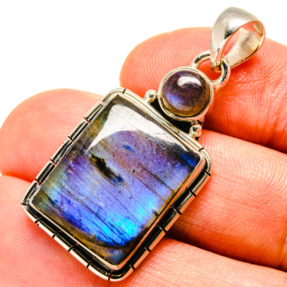 Labradorite pendant with rectangular iridescent stone, silver bezel and round bail accent