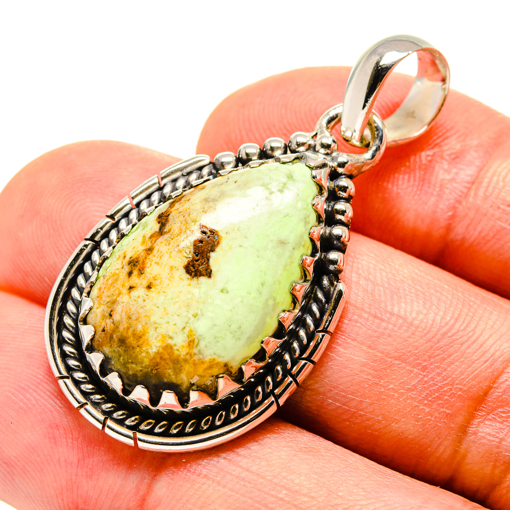 Sterling silver pendant with oval lemon-green chrysoprase cabochon and beaded frame