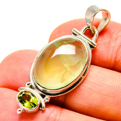 Sterling silver pendant with large oval prehnite and small round peridot, bail loop