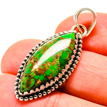 Green turquoise teardrop pendant with 925 sterling silver setting and beaded border