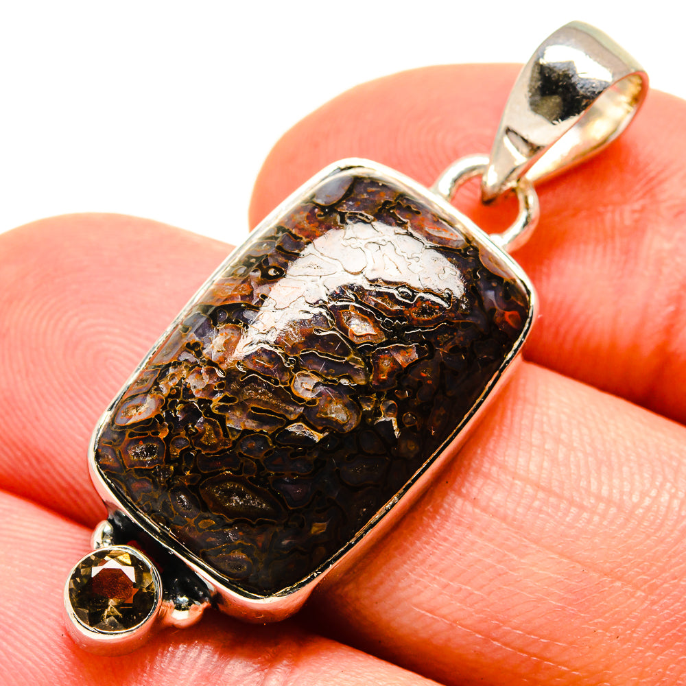 Sterling silver pendant with smoky dark brown rectangular stone and two round accents