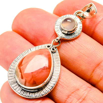 Rose quartz pendant in 925 sterling silver, teardrop stone with circular bail