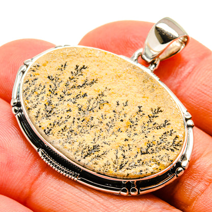 Oval 925 sterling silver pendant with yellow stone and black dendrite pattern, bail