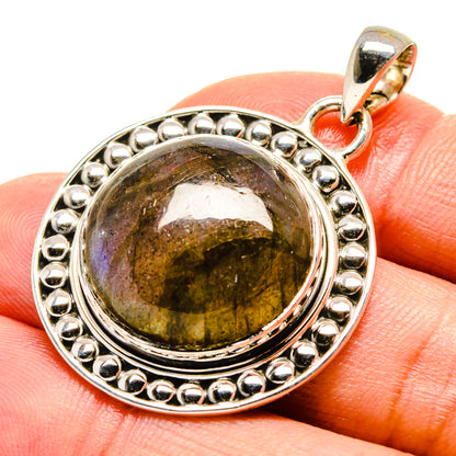 Labradorite pendant with oval dark green-gold stone in 925 sterling silver bezel, bead border