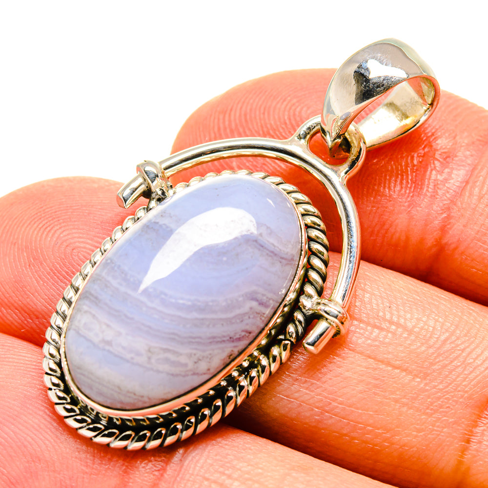 Oval blue lace agate pendant in sterling silver with ornate rope bezel and bail